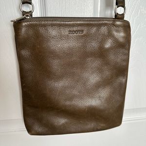 ROOTS genuine leather crossbody bag.